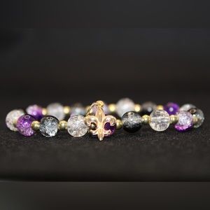 Purple, gold and black glass beaded bracelet